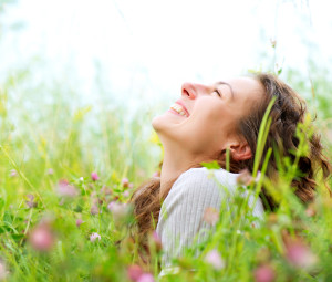 Beautiful Young Woman Outdoors. Enjoy Nature. Meadow