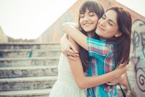 beautiful hipster young women sisters friends in the city